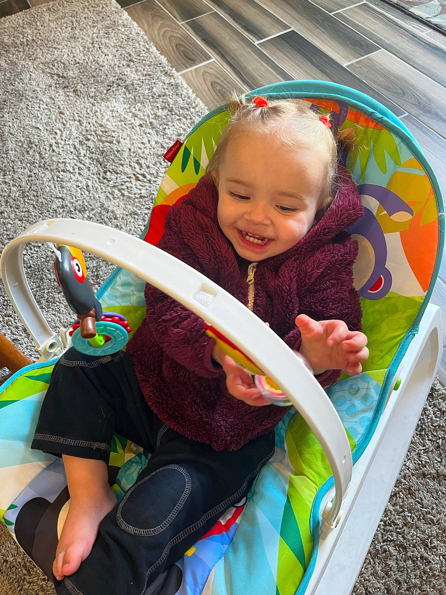Kora is registered to the contest to win money with this photo: auto_part, automotive_exterior, automotive_wheel_system, baby, baby_products, baby_toddler_clothing, child, city, fun, grass, green, happy, joy, leisure, motor_vehicle, person, play, recreation, sitting, smile
