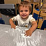 Wyatt joined the competition — help win amazing prizes! child, foam, table, smile, playful, indoor, hands, classroom, chair, young, messy, education, happy, person, fun, toddler, light_skin, short_hair, shirt, learning