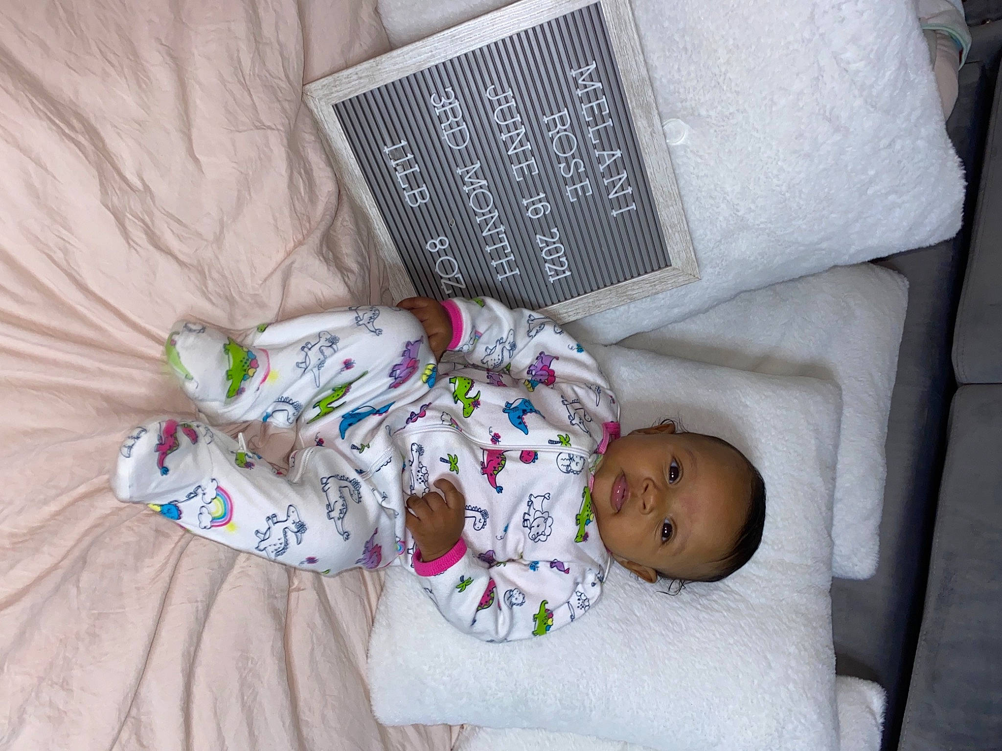 Melani is registered to the contest to win money with this photo: baby, baby_products, baby_safety, baby_sleeping, baby_toddler_clothing, bed, bedding, bedtime, child, comfort, couch, flooring, head, human_body, linens, mammal, nap, person, room, textile