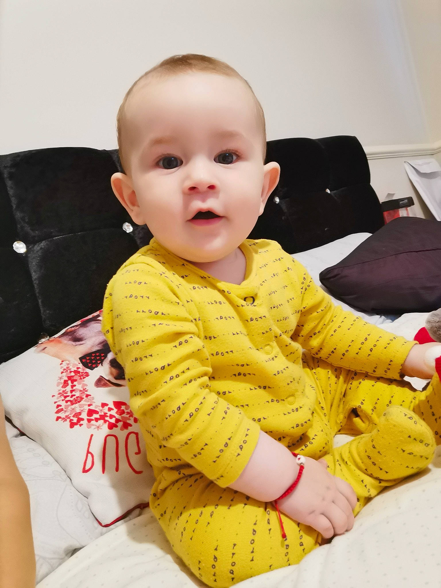 Matei is registered to the contest to win money with this photo: baby, baby_toddler_clothing, beauty, cheek, child, face, head, lip, nose, outerwear, person, sitting, skin, sleeve, toddler, yellow