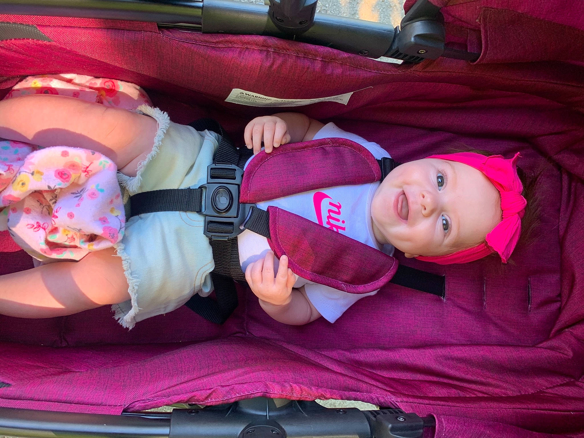 Journee joined the competition — help win amazing prizes! baby, baby_carriage, baby_products, baby_toddler_clothing, car_seat, carmine, child, comfort, fun, headwear, lap, linens, magenta, person, pink, product, purple, sock, textile, thigh