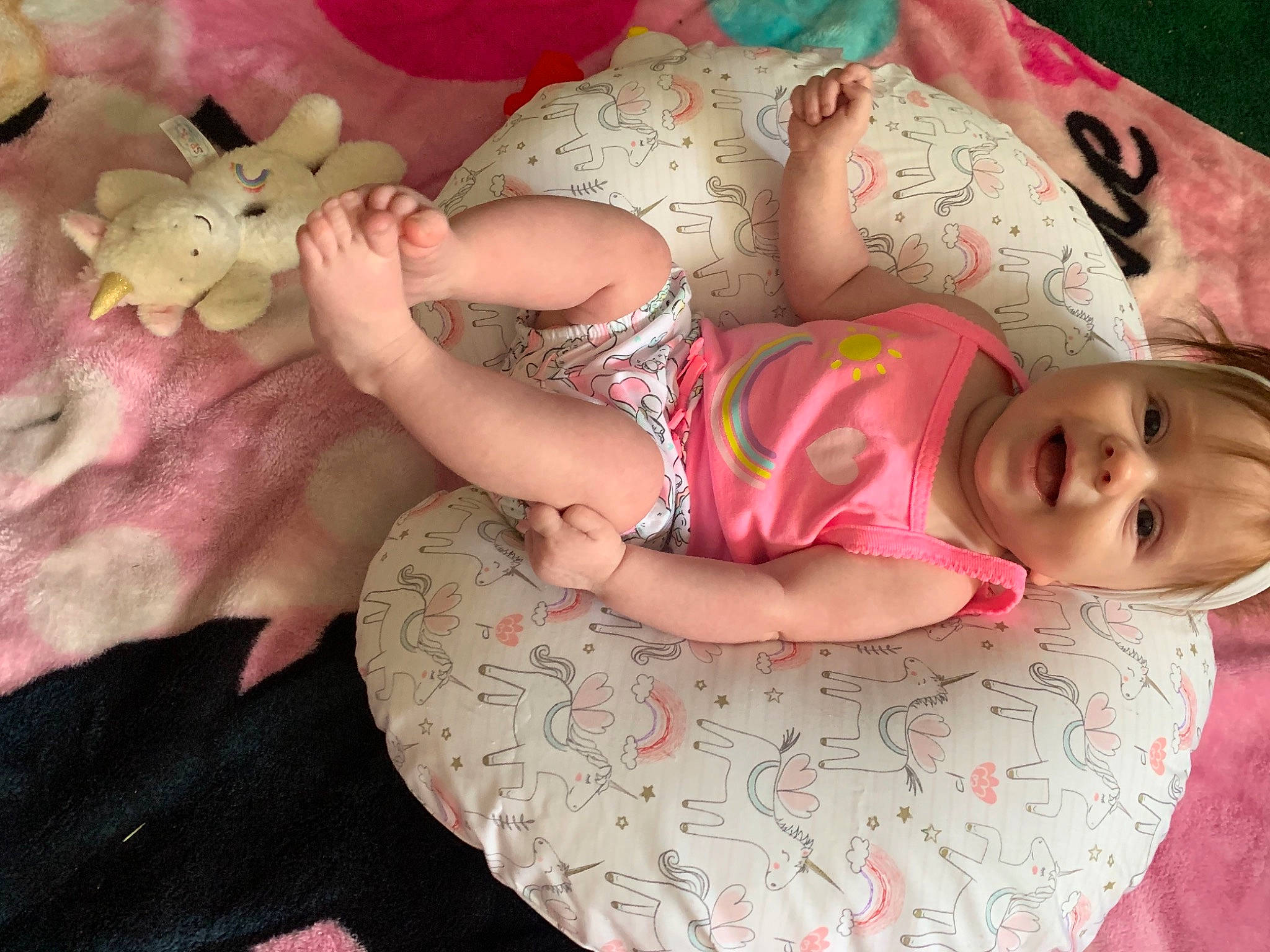 Journee is registered to the contest to win money with this photo: baby, baby_toddler_clothing, cheek, child, comfort, dress, eye, finger, glasses, hand, head, human_body, leg, linens, person, pink, skin, sleeve, textile, thigh