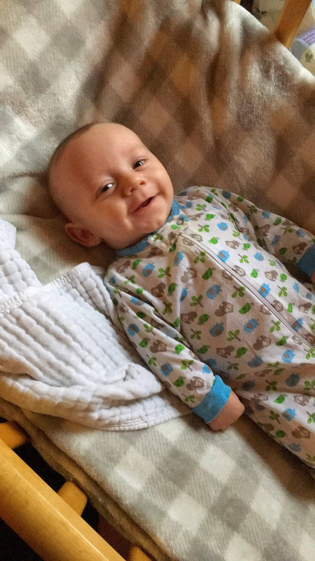 Caleb is registered to the contest to win money with this photo: baby, blanket, cheek, child, person, skin, toddler