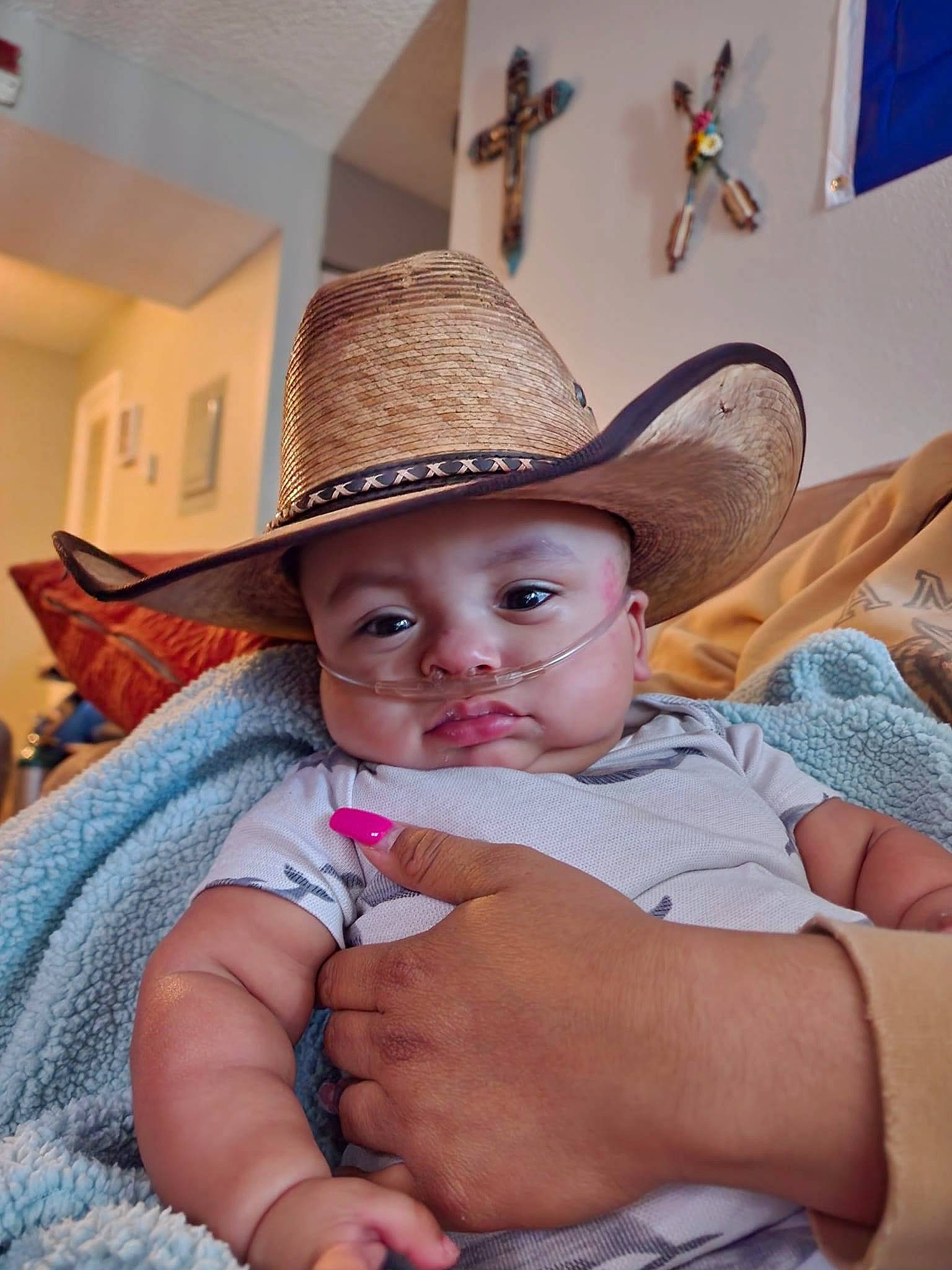 Kian is registered to the contest to win money with this photo: baby, baby_toddler_clothing, blond, cap, child, comfort, eye, fashion_accessory, fun, happy, hat, headgear, headwear, iris, lip, person, sitting, skin, smile, sun_hat