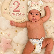 Alisson is registered to the contest to win money with this photo: baby, infant, child, portrait, lying_down, smiling, happy, face, hat, diaper, blanket, crescent_moon, clouds, stars, pink, pastel, indoor, milestone, two_months, photography