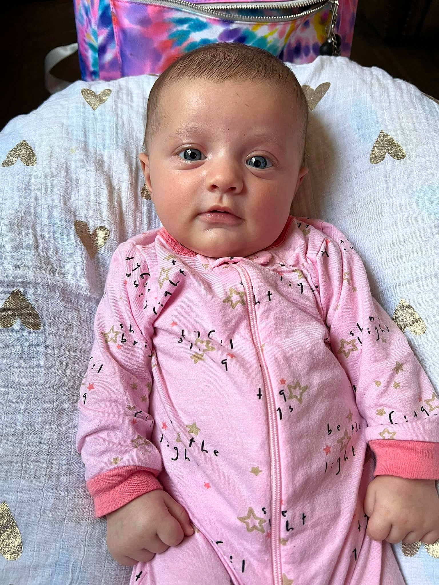 Adaline joined the competition — help win amazing prizes! baby, baby_toddler_clothing, cheek, chin, facial_expression, finger, forehead, hairstyle, human, iris, lip, mouth, nose, organ, person, pink, purple, skin, sleeve, textile