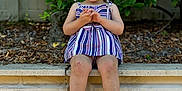 Nataleigh is registered to the contest to win money with this photo: ankle, bodypart, child, clothing, dress, face, female, finger, footwear, girl, hand, head, pants, person, photography, portrait, sandal, shoe, shorts, sitting