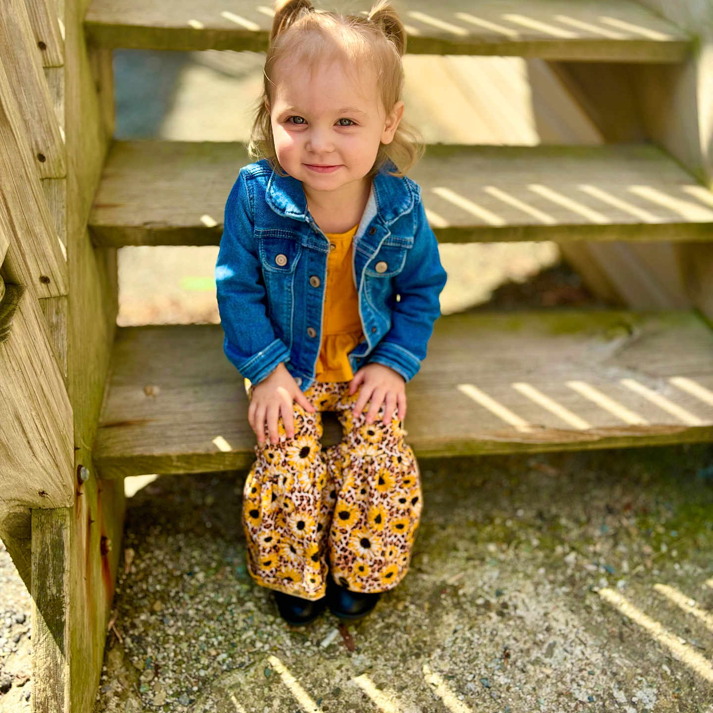 Nataleigh is registered to the contest to win money with this photo: architecture, building, child, clothing, coat, face, female, girl, head, house, housing, jacket, jeans, pants, person, photography, portrait, sitting, staircase, wood