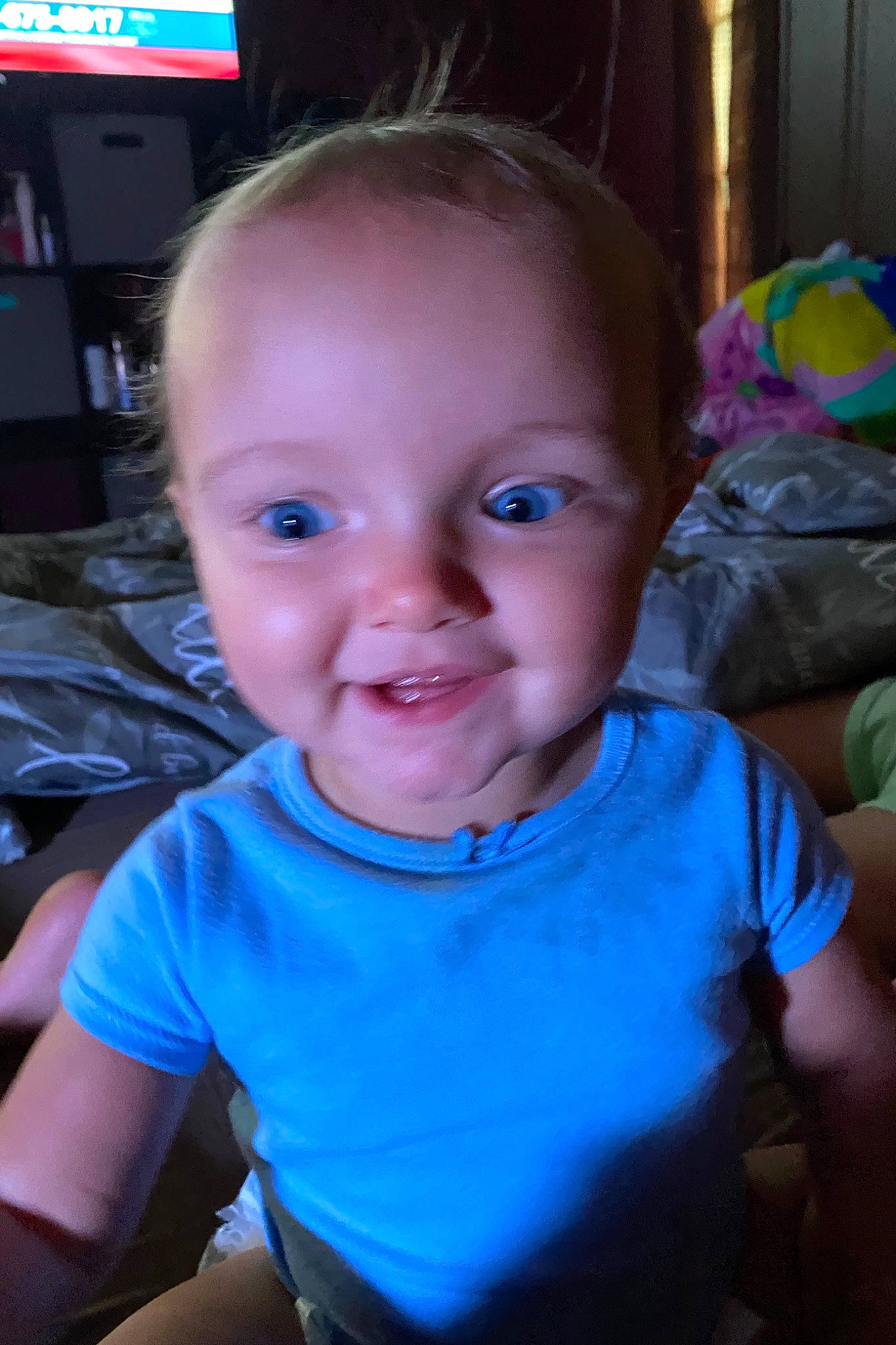 Alivia is registered to the contest to win money with this photo: baby, blue, cheek, child, chin, ear, eye, eyebrow, face, facial_expression, forehead, fun, head, iris, joy, lip, mouth, nose, person, skin