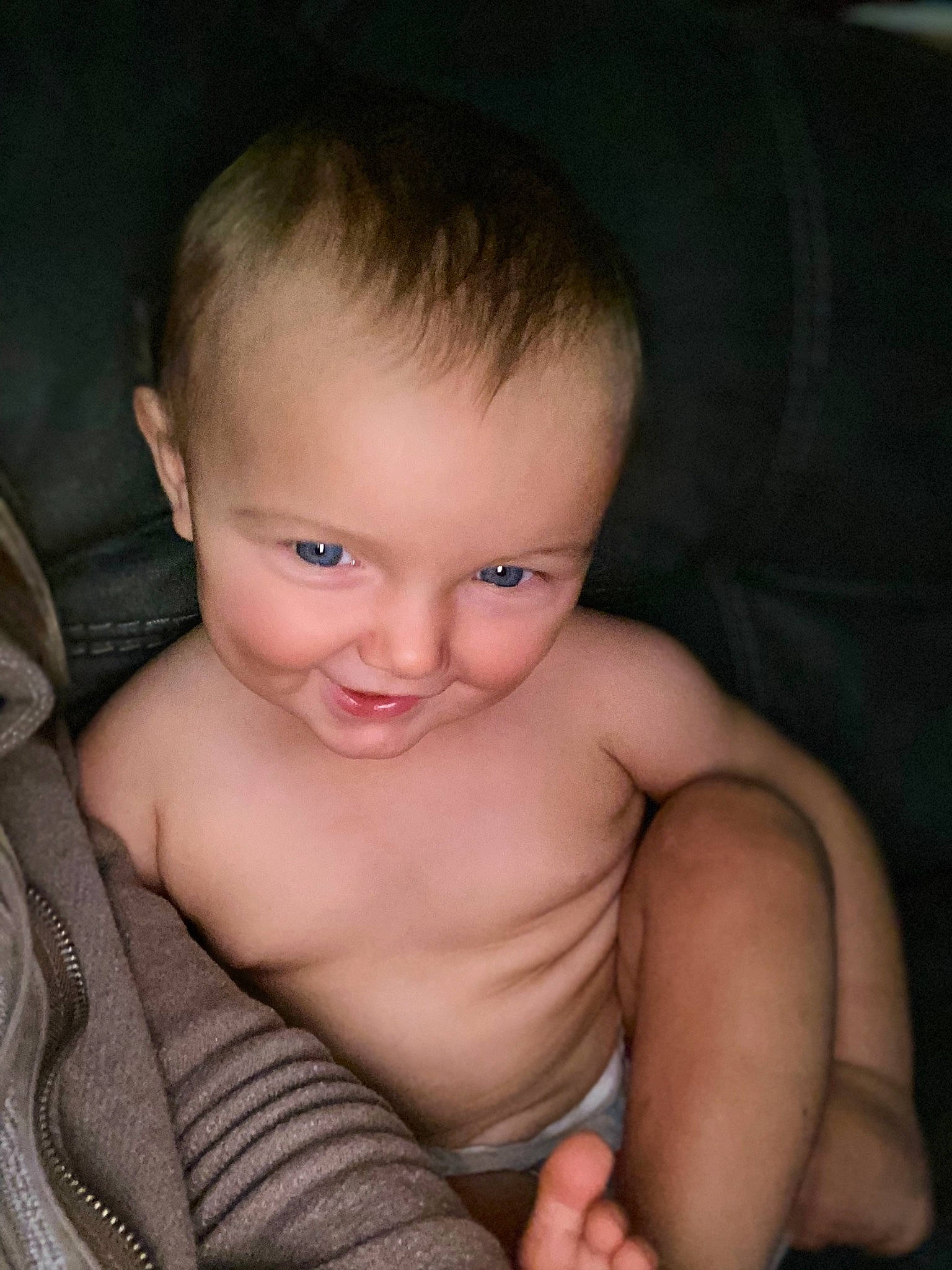 Alivia is registered to the contest to win money with this photo: arm, baby, cheek, chest, child, chin, eye, face, finger, forehead, hand, head, iris, joy, lip, mouth, muscle, nose, person, sitting