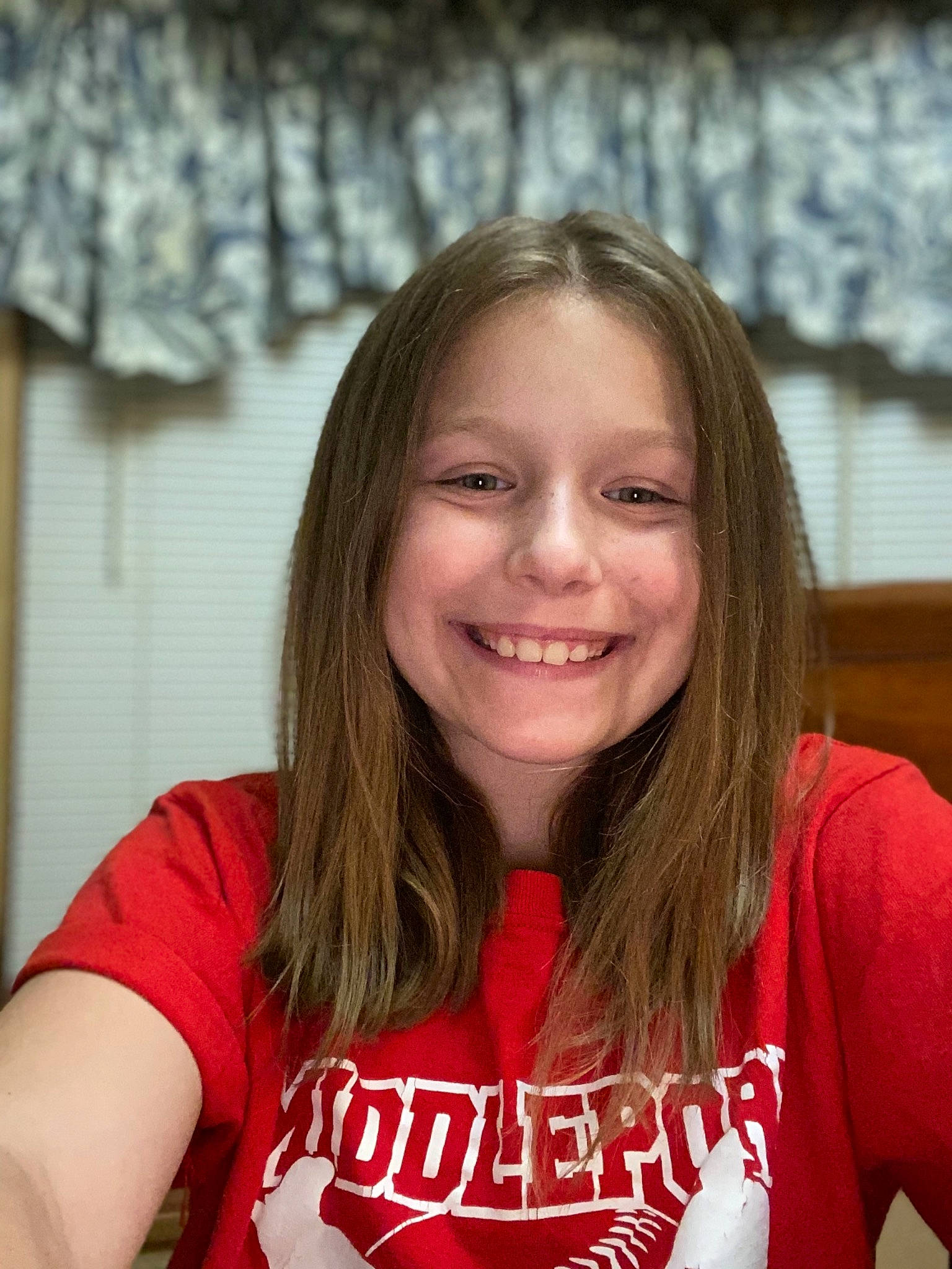 Trysten is registered to the contest to win money with this photo: blond, brown_hair, chin, face, fun, hair, joy, long_hair, person, smile, t_shirt
