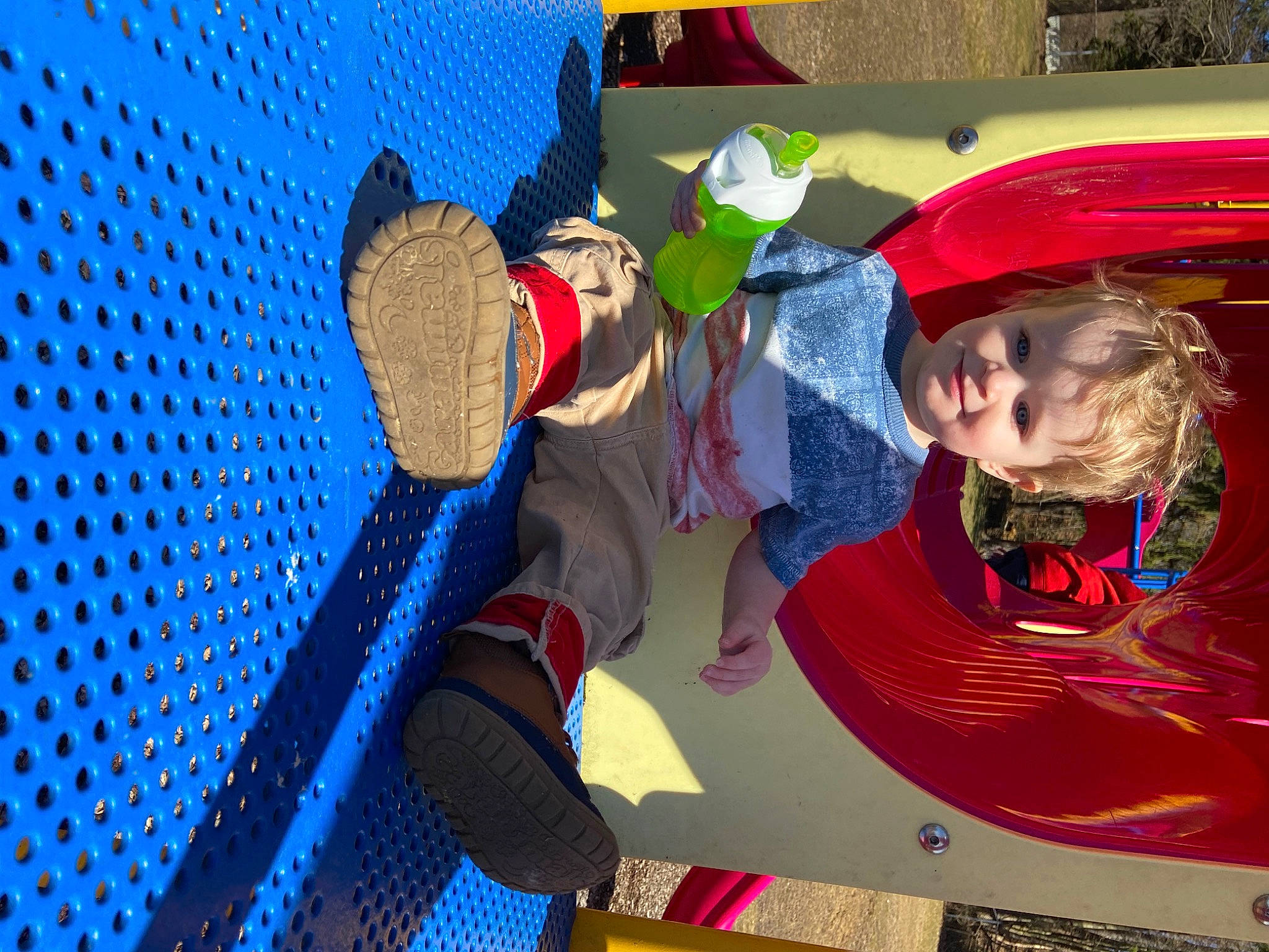 Kolt is registered to the contest to win money with this photo: child, circle, electric_blue, fashion_accessory, flooring, fun, hat, joy, leisure, magenta, mesh, net, pattern, person, play, recreation, red, room, smile, sun_hat