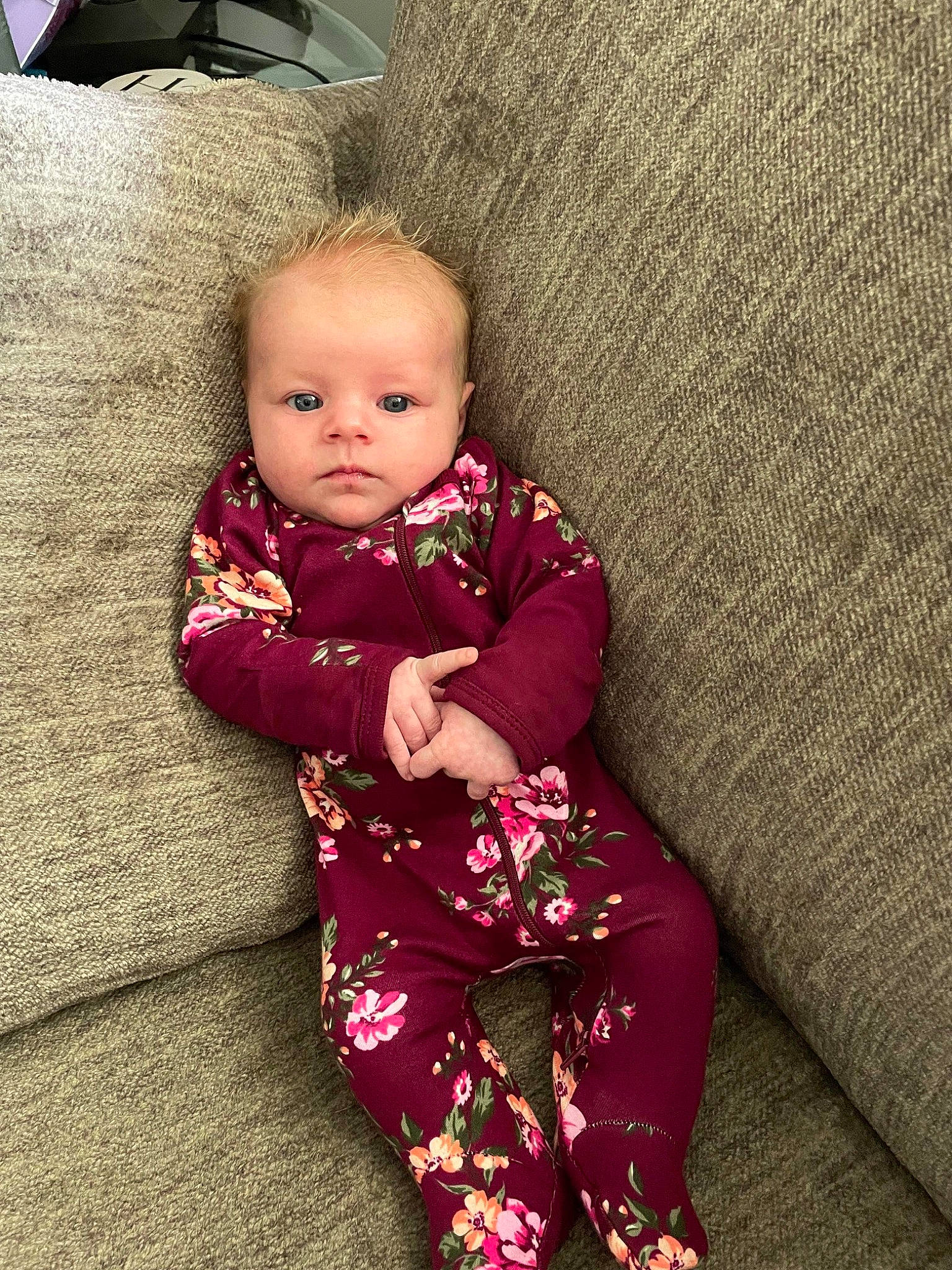 Anna joined the competition — help win amazing prizes! baby, baby_toddler_clothing, carpet, cheek, child, comfort, flooring, fun, human_leg, linens, magenta, pajamas, pattern, person, pink, sitting, skin, sleeve, smile, toddler
