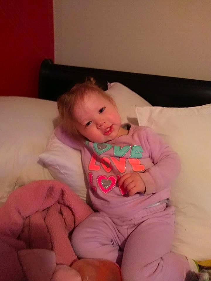 Arabellah is registered to the contest to win money with this photo: arm, baby_products, bedtime, cheek, child, day, finger, girl, human_hair_color, infant, leg, mouth, nose, person, pink, product, sitting, skin, sleep, textile