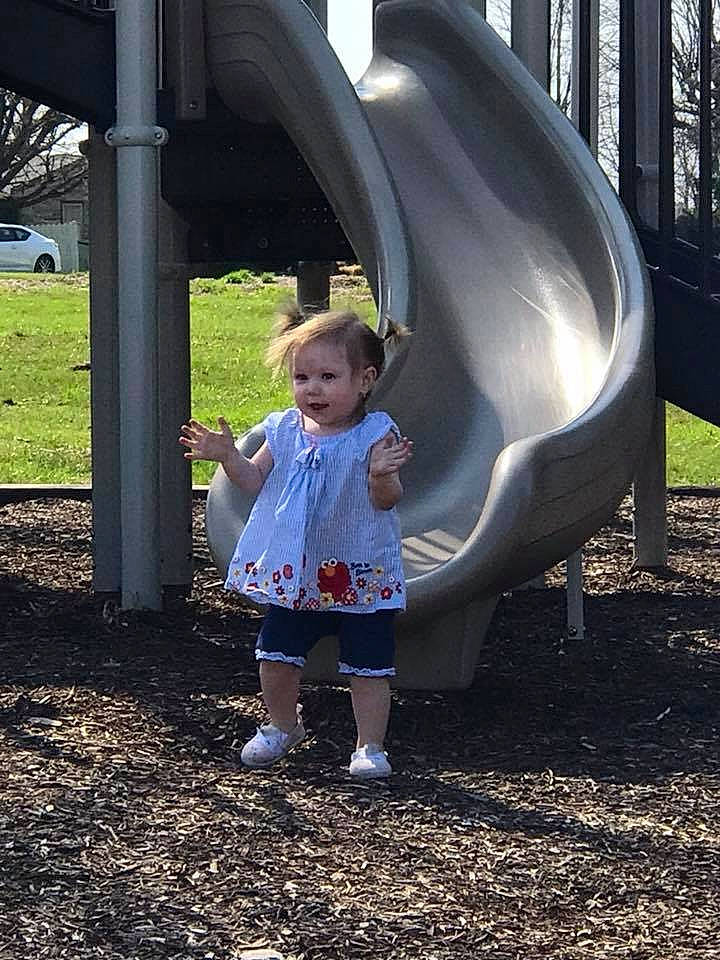 Arabellah is registered to the contest to win money with this photo: child, fun, girl, outdoor_play_equipment, person, play, playground, playground_slide, public_space, recreation, toddler, tree, vacation