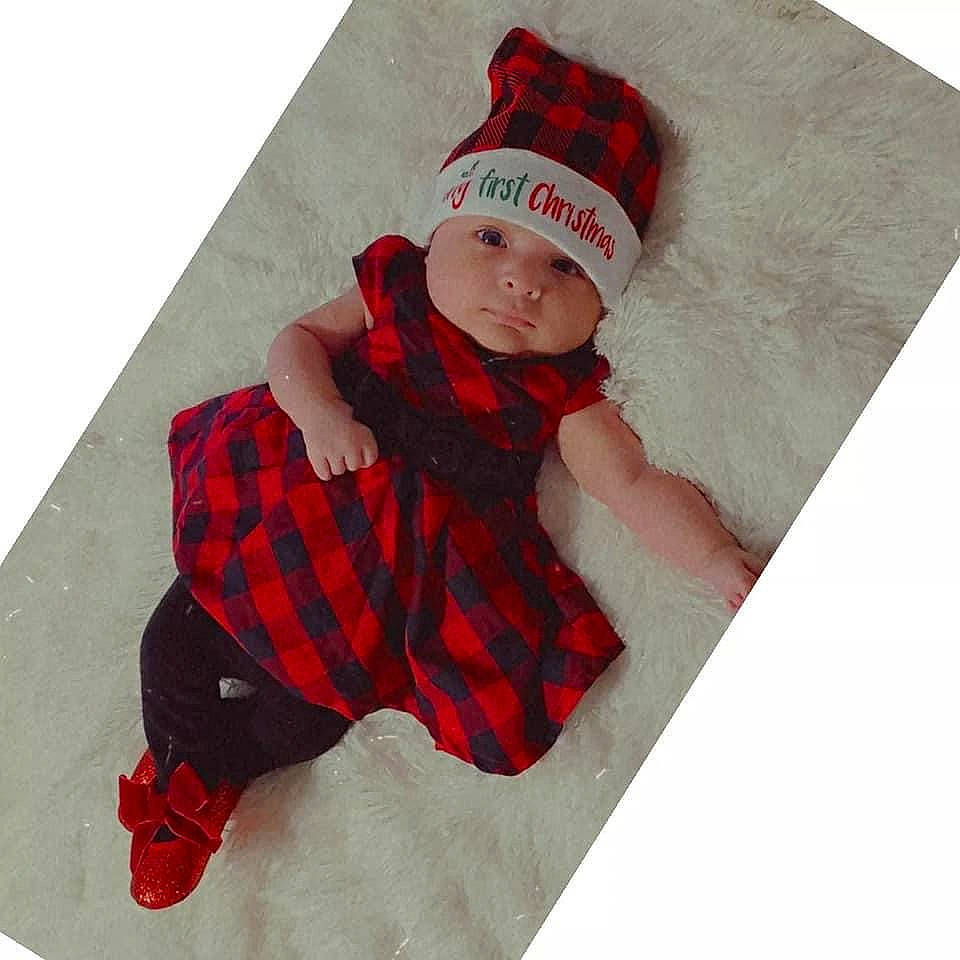 Alessandra joined the competition — help win amazing prizes! baby, baby_toddler_clothing, beanie, bonnet, carmine, costume, costume_accessory, costume_hat, fictional_character, headwear, knit_cap, maroon, pattern, person, plaid, red, sleeve, tartan, textile, winter
