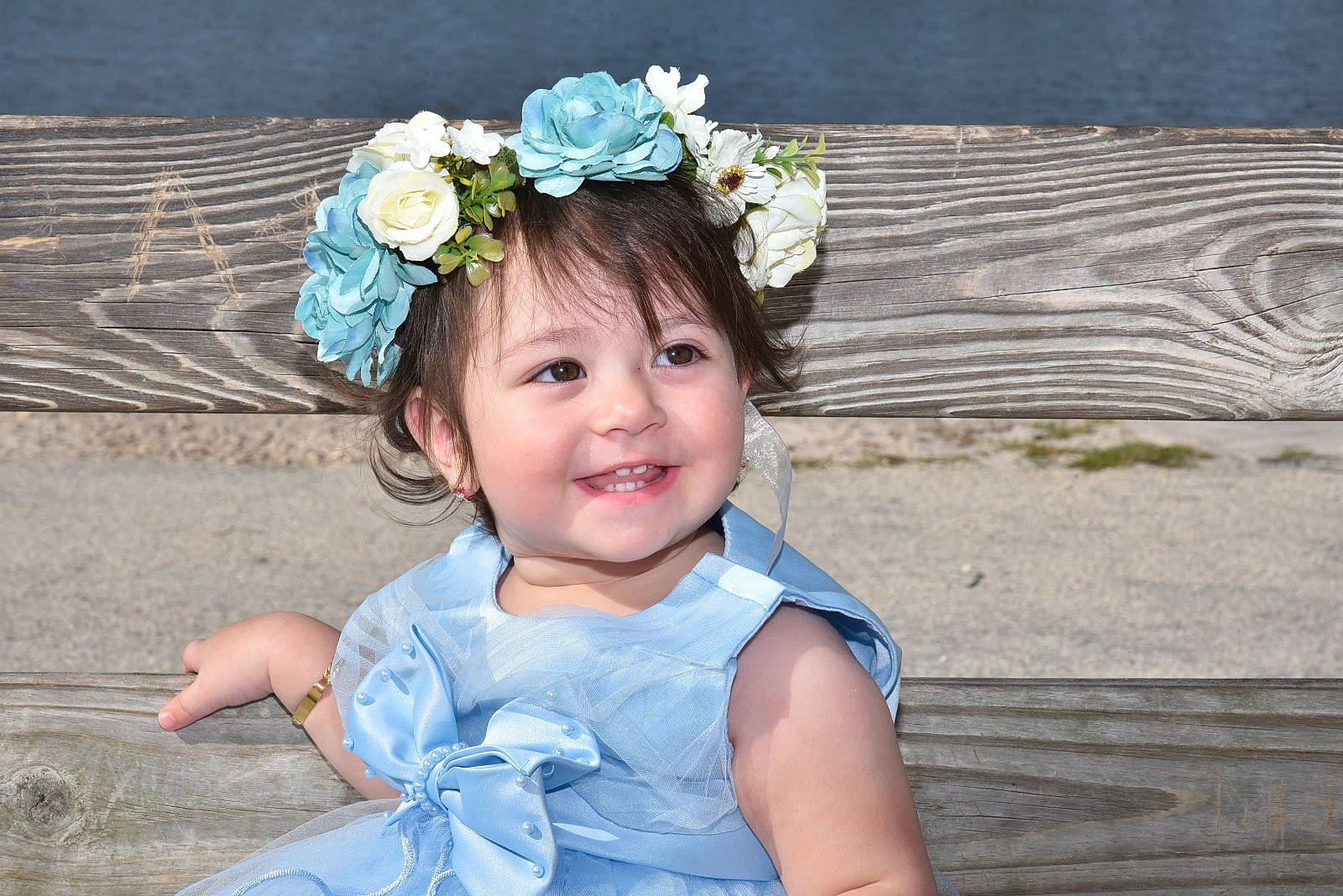 Chrishell joined the competition — help win amazing prizes! baby_toddler_clothing, blue, child, chin, cool, dress, eye, flash_photography, flower, grass, happy, head, headgear, headpiece, iris, joy, person, petal, pink, plant