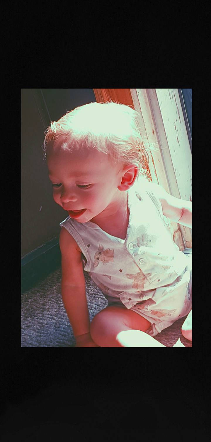 Liam is registered to the contest to win money with this photo: baby, baby_toddler_clothing, beauty, cheek, child, comfort, flash_photography, flooring, fun, happy, human_leg, laugh, lip, magenta, person, portrait, portrait_photography, sitting, smile, stock_photography