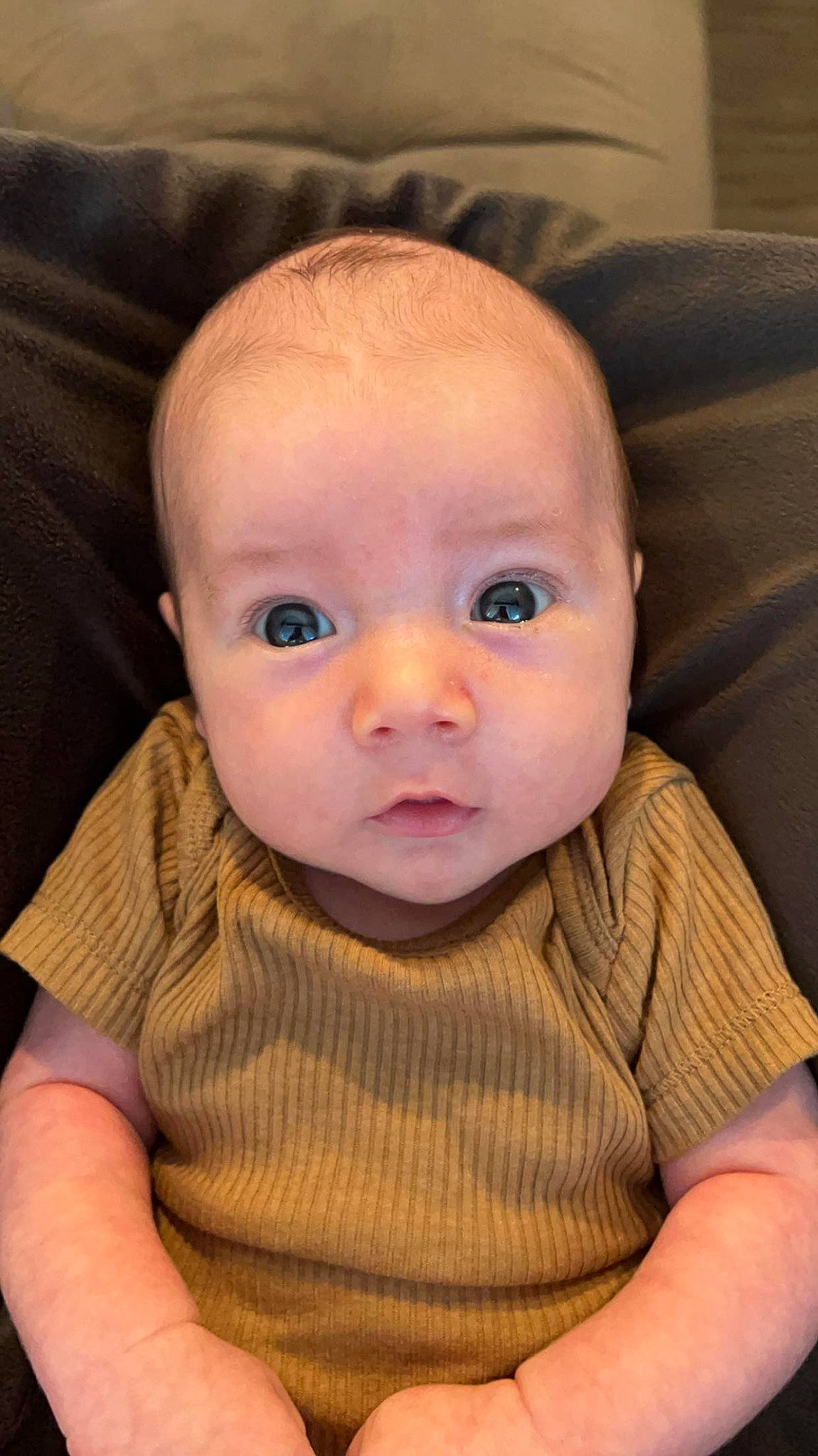 Blaise joined the competition — help win amazing prizes! baby, baby_toddler_clothing, cheek, child, clothing, comfort, ear, eyebrow, eyelash, fun, iris, lip, mouth, nose, person, sitting, skin, sleeve, thumb, toddler