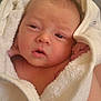 Leo is registered to the contest to win money with this photo: baby, newborn, towel, wrapped, face, skin, hand, curious, sleepy, indoor, closeup, portrait, soft, fluffy, white, infant, child, person, cute, resting