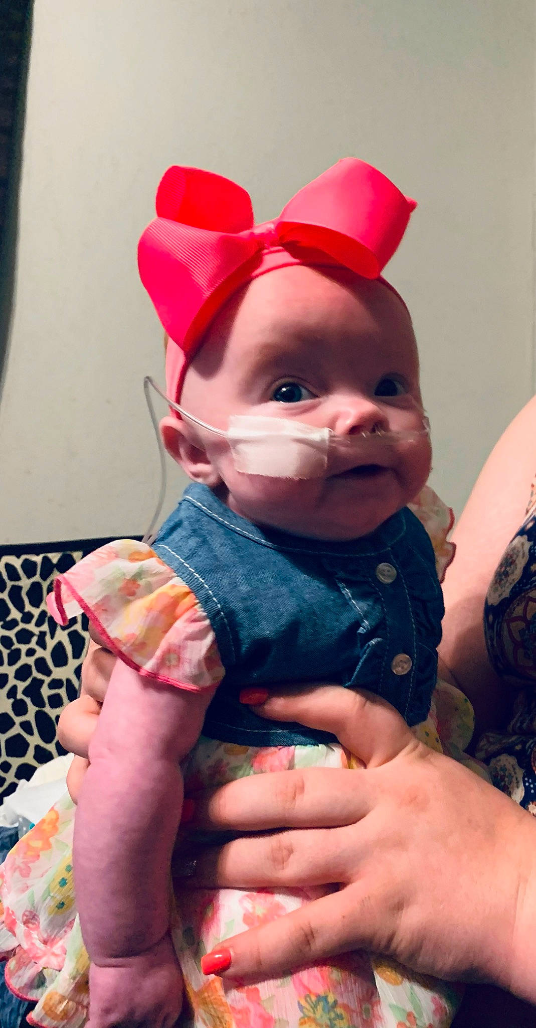 Maggie is registered to the contest to win money with this photo: baby, baby_toddler_clothing, cap, cheek, child, dress, face, facial_expression, finger, fun, gesture, hand, happy, hat, head, lip, person, pink, skin, thumb