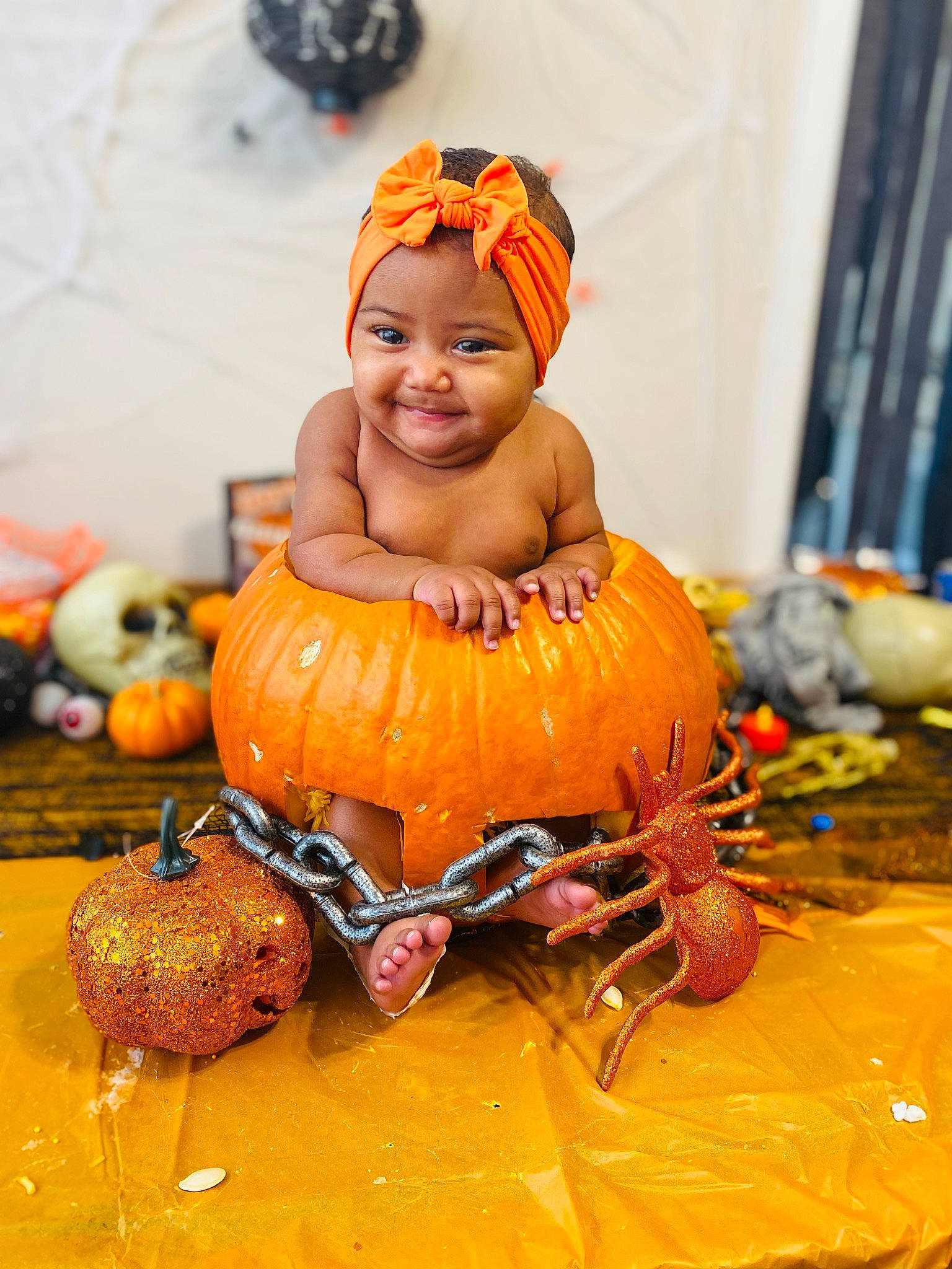 Naiomi is registered to the contest to win money with this photo: calabaza, cucurbita, food, gourd, happy, headwear, jack_o_lantern, joy, local_food, natural_foods, orange, person, plant, produce, pumpkin, smile, squash, toddler, tradition, trick_or_treat