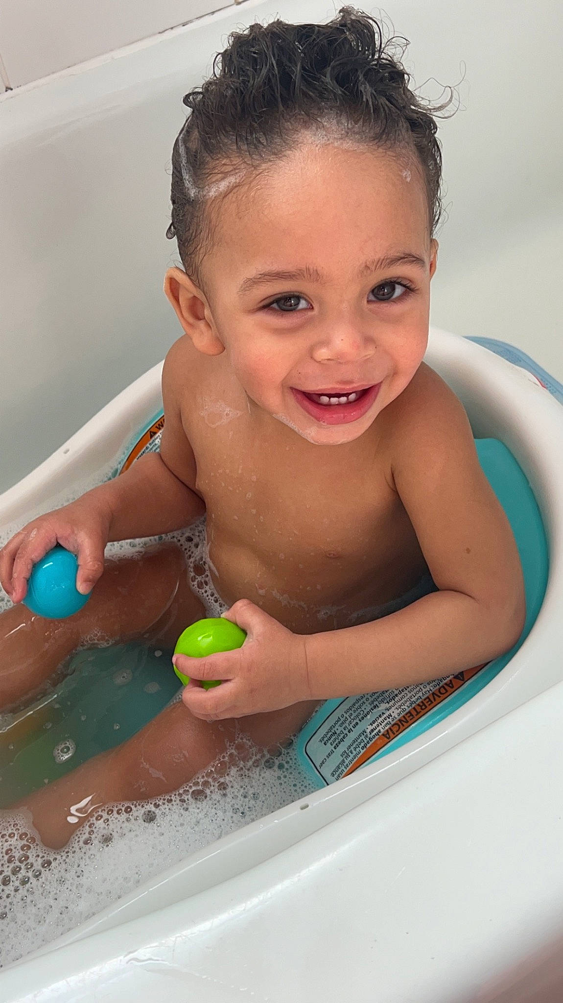 Denzel joined the competition — help win amazing prizes! arm, baby_bathing, bath_toy, bathing, bathtub, chest, child, eyelash, fluid, fun, happy, joy, leisure, liquid, person, plumbing, plumbing_fixture, recreation, skin, smile