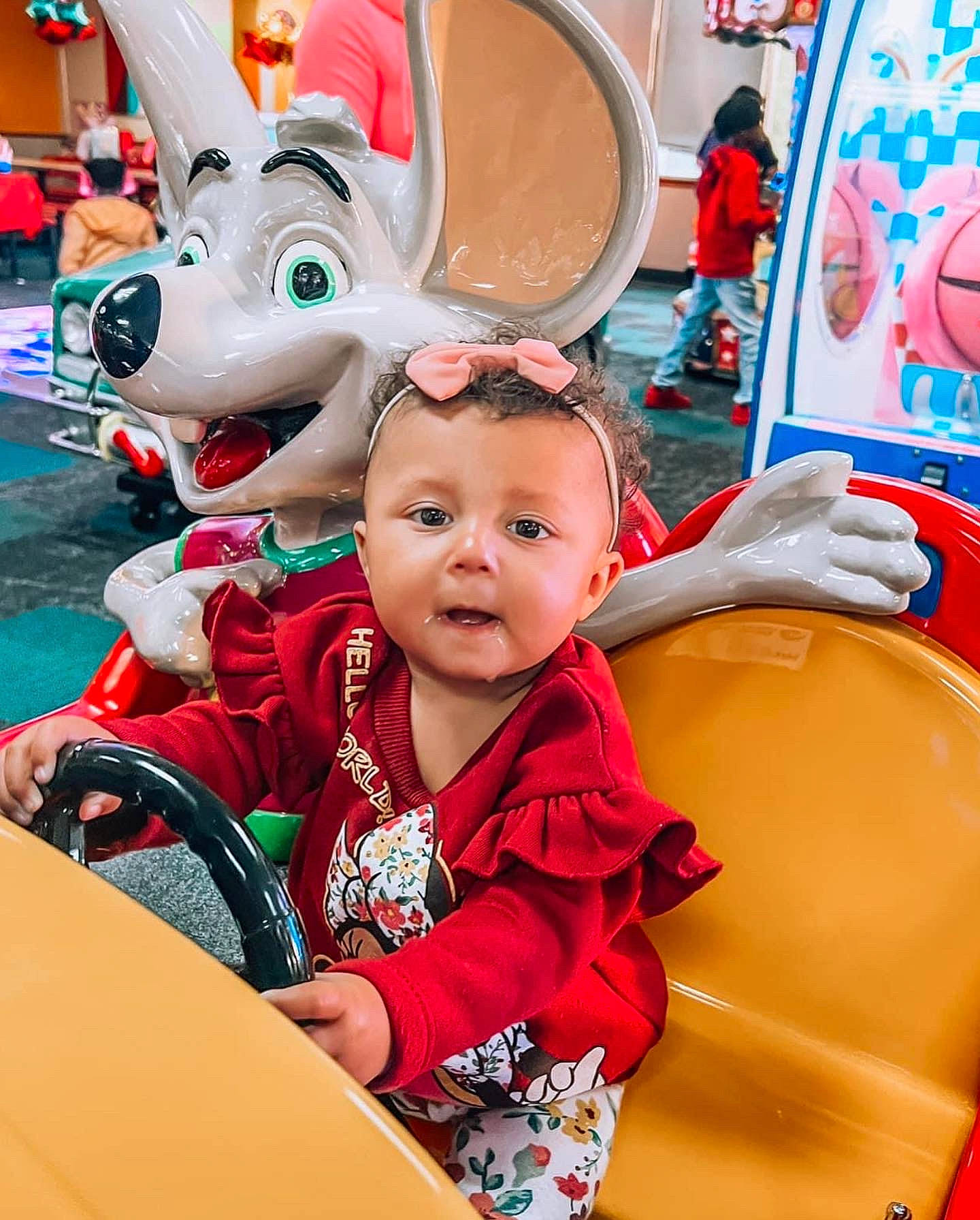 Adalynn is registered to the contest to win money with this photo: amusement_park, amusement_ride, baby, child, event, fun, happy, leisure, mascot, nonbuilding_structure, organ, person, photograph, playground, public_space, recreation, red, snapshot, toddler, travel