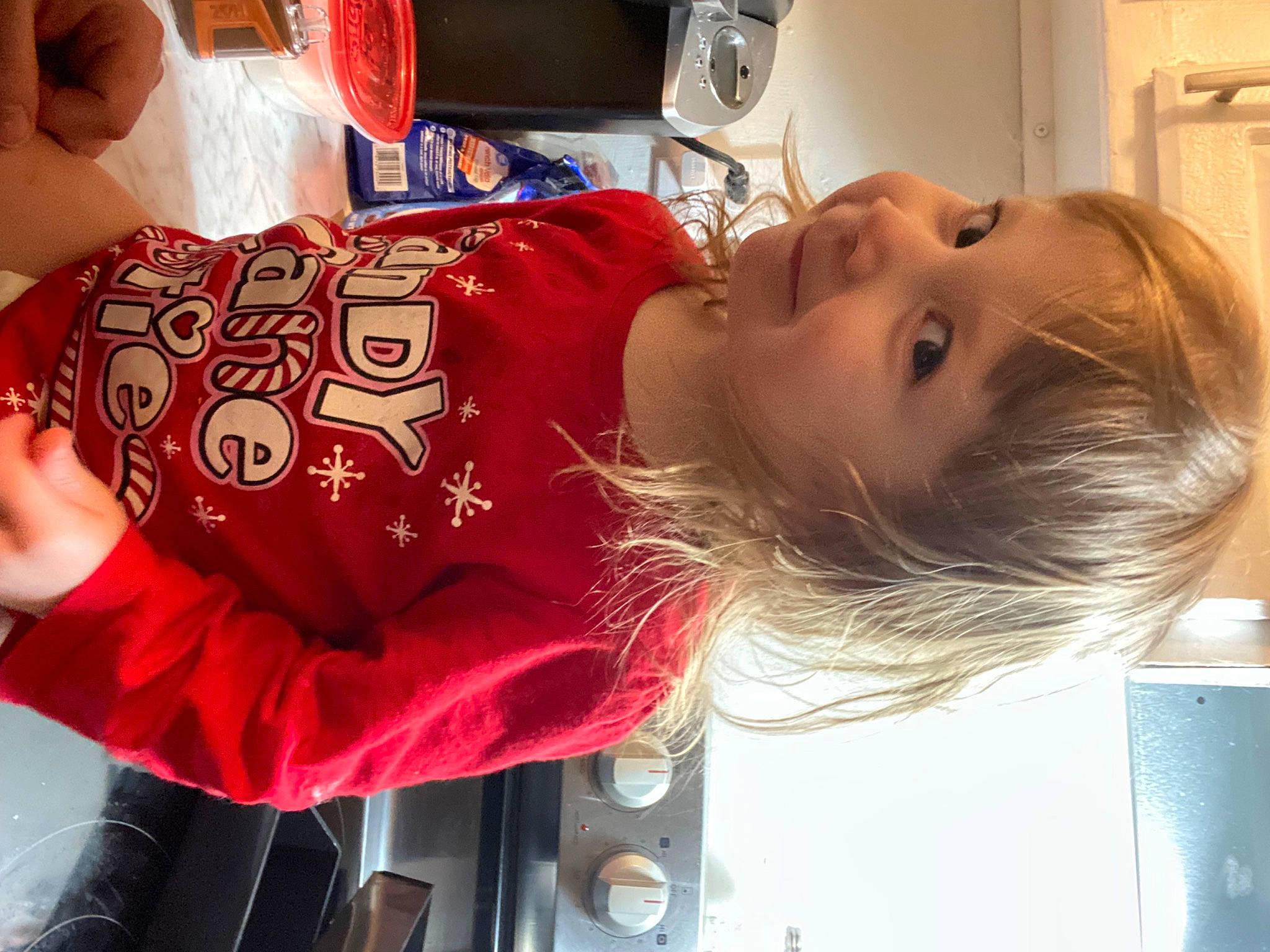 Lillian is registered to the contest to win money with this photo: child, drink, elbow, food, fun, joy, mouth, person, room, smile, toddler, wrist