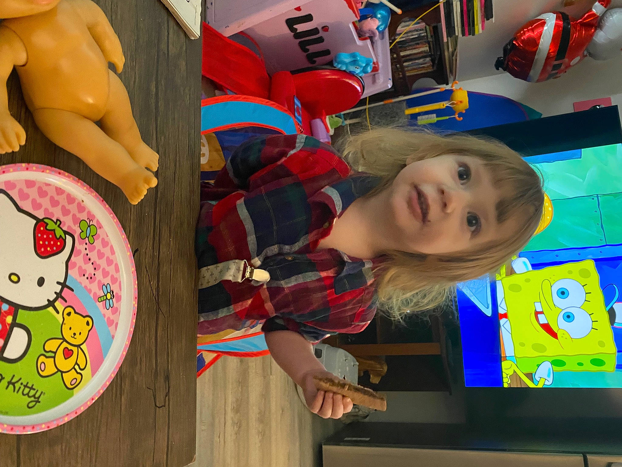 Lillian is registered to the contest to win money with this photo: chest, child, electric_blue, fictional_character, fun, games, leisure, person, personal_protective_equipment, play, product, recreation, room, t_shirt, toddler, toy, visual_arts