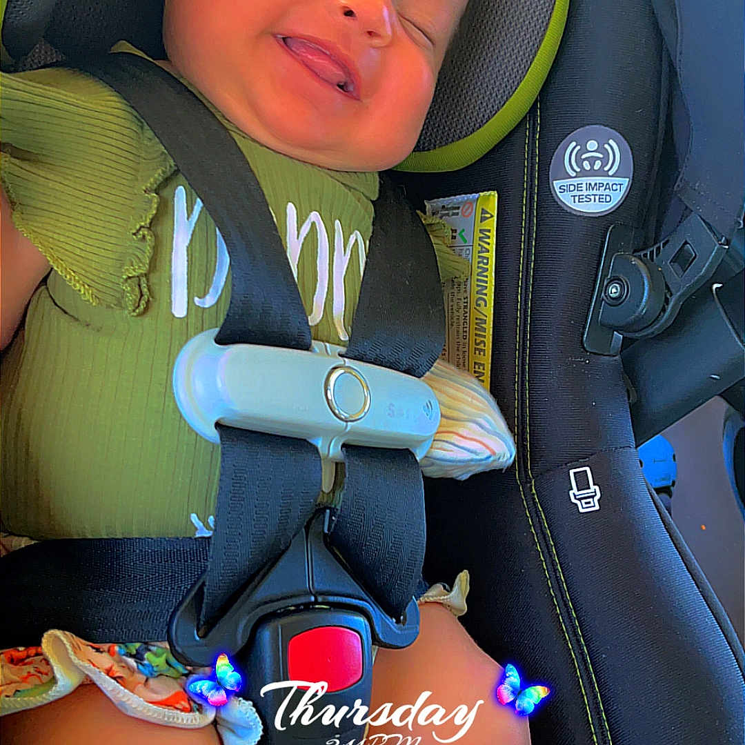 Katalina is registered to the contest to win money with this photo: accessories, baby, belt, bodypart, car, car_interior, carseat, cushion, face, finger, hand, head, headrest, homedecor, person, photography, portrait, seatbelt, transportation, vehicle