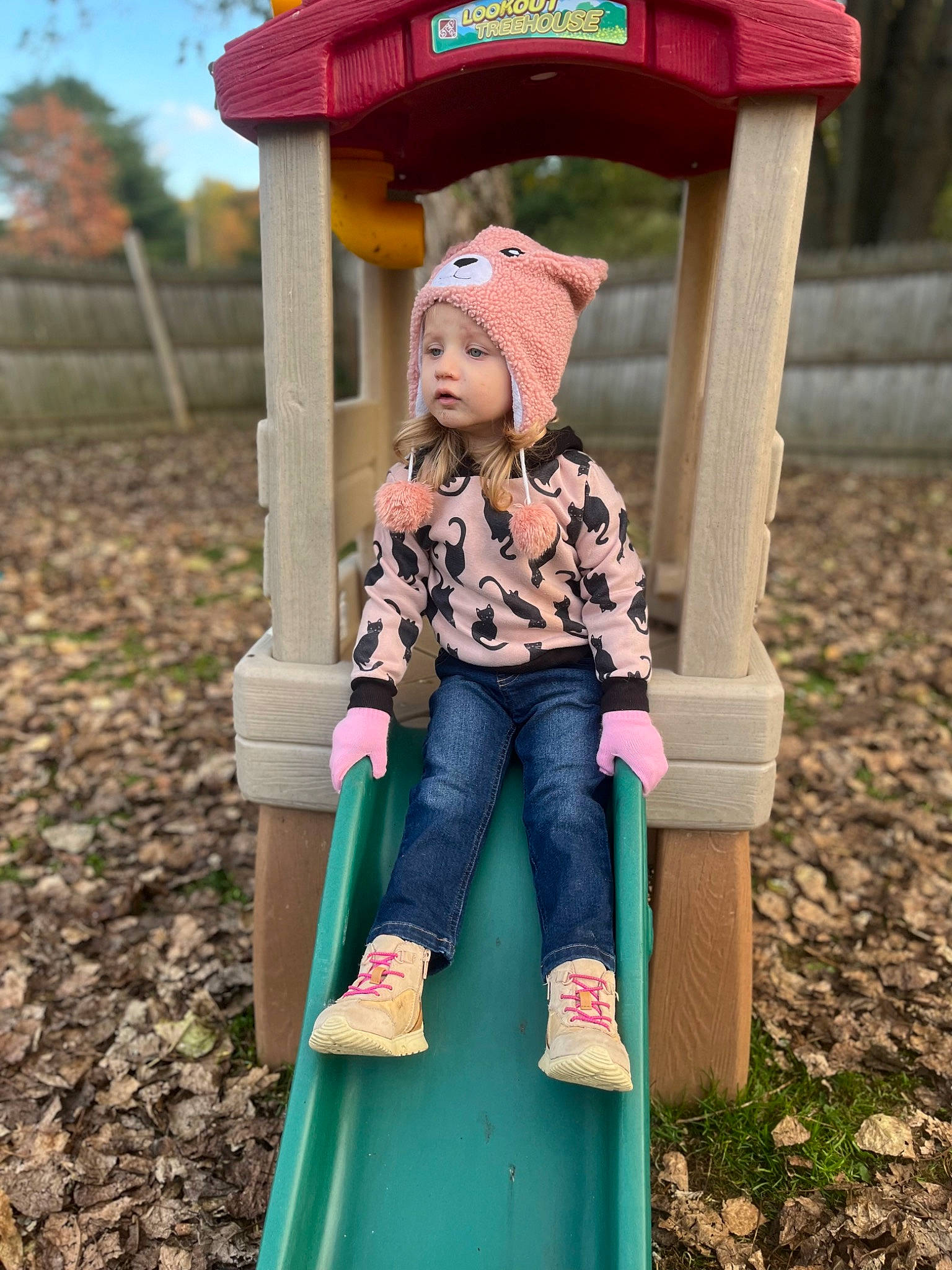 Ezlynn is registered to the contest to win money with this photo: blond, chute, city, fun, grass, happy, headwear, leaf, leisure, outdoor_play_equipment, people_in_nature, person, photograph, pink, plant, playground, playground_slide, public_space, recreation, toddler