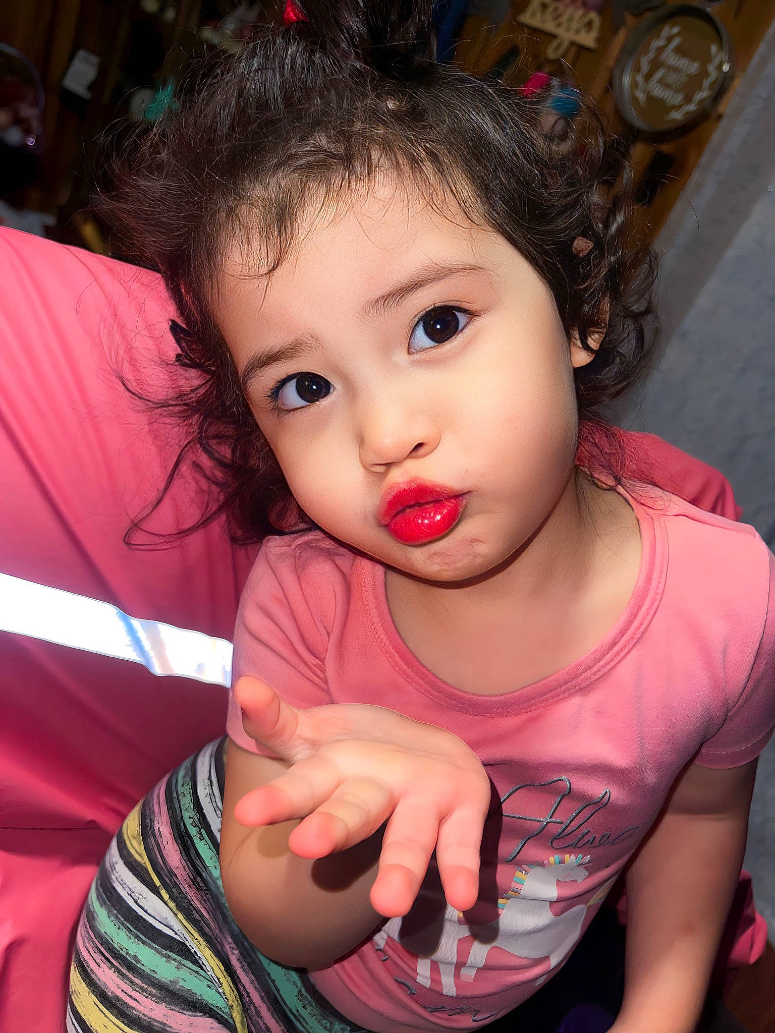 Izabella joined the competition — help win amazing prizes! baby_toddler_clothing, cheek, child, chin, ear, eyelash, flash_photography, fun, gesture, happy, iris, lip, long_hair, nose, person, pink, sitting, skin, smile, t_shirt