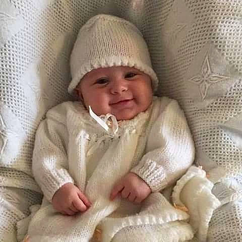 Lexi-mae joined the competition — help win amazing prizes! bonnet, child, crochet, fur, headgear, headwear, infant, knit_cap, knitting, material, nose, person, product, skin, smile, textile, toddler, wool