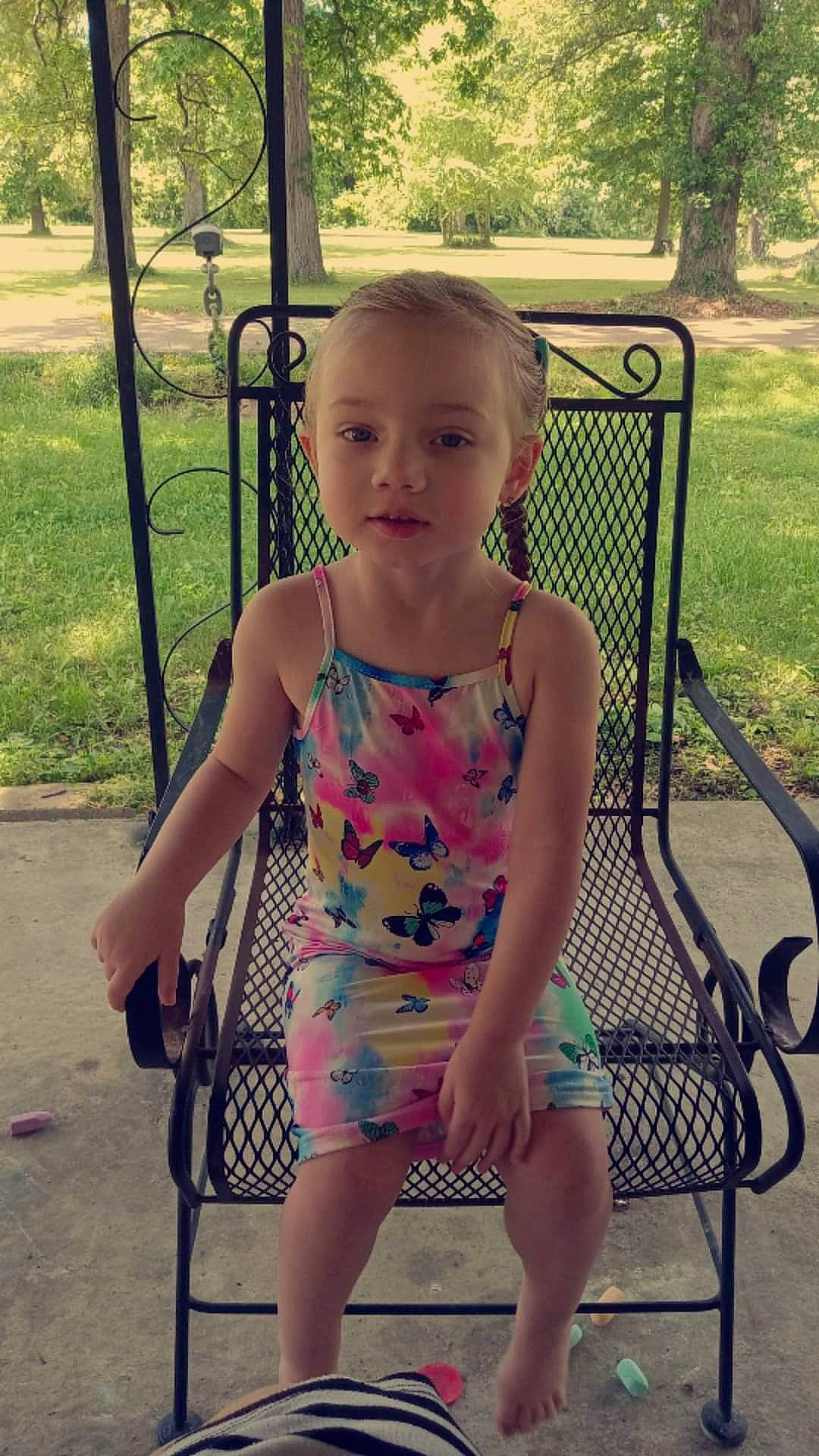 Emmalee joined the competition — help win amazing prizes! baby_toddler_clothing, child, clothing, dress, facial_expression, fun, grass, happy, human_leg, leisure, morning, person, plant, public_space, recreation, skin, standing, summer, thigh, toddler