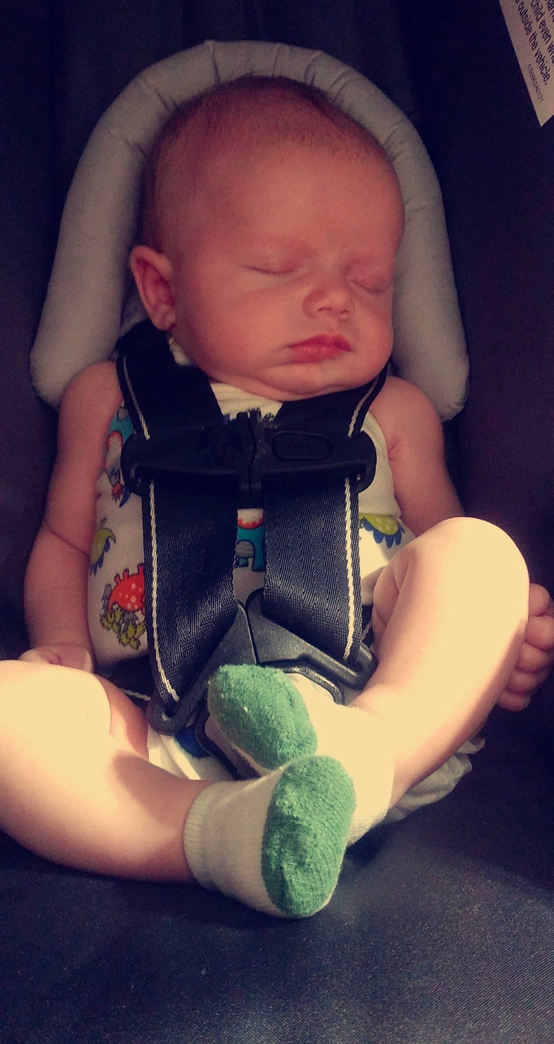 Jeremiah is registered to the contest to win money with this photo: baby, baby_carriage, baby_toddler_clothing, cheek, chin, comfort, cool, finger, hand, human_body, iris, joint, leg, lip, mouth, neck, nose, person, shoulder, skin