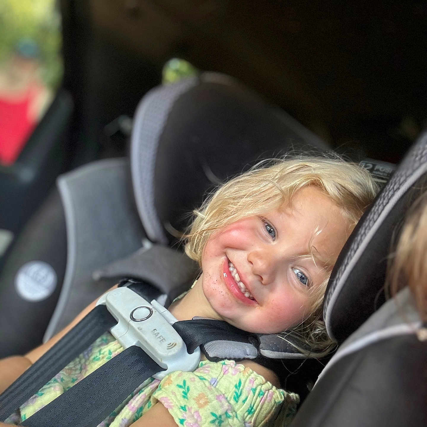 Laelynn is registered to the contest to win money with this photo: blonde_hair, car_interior, car_seat, casual, child, child_safety, childhood, clothing, cute, face, happy, indoor, person, portrait, safety, seat, seatbelt, smile, toddler, young_child