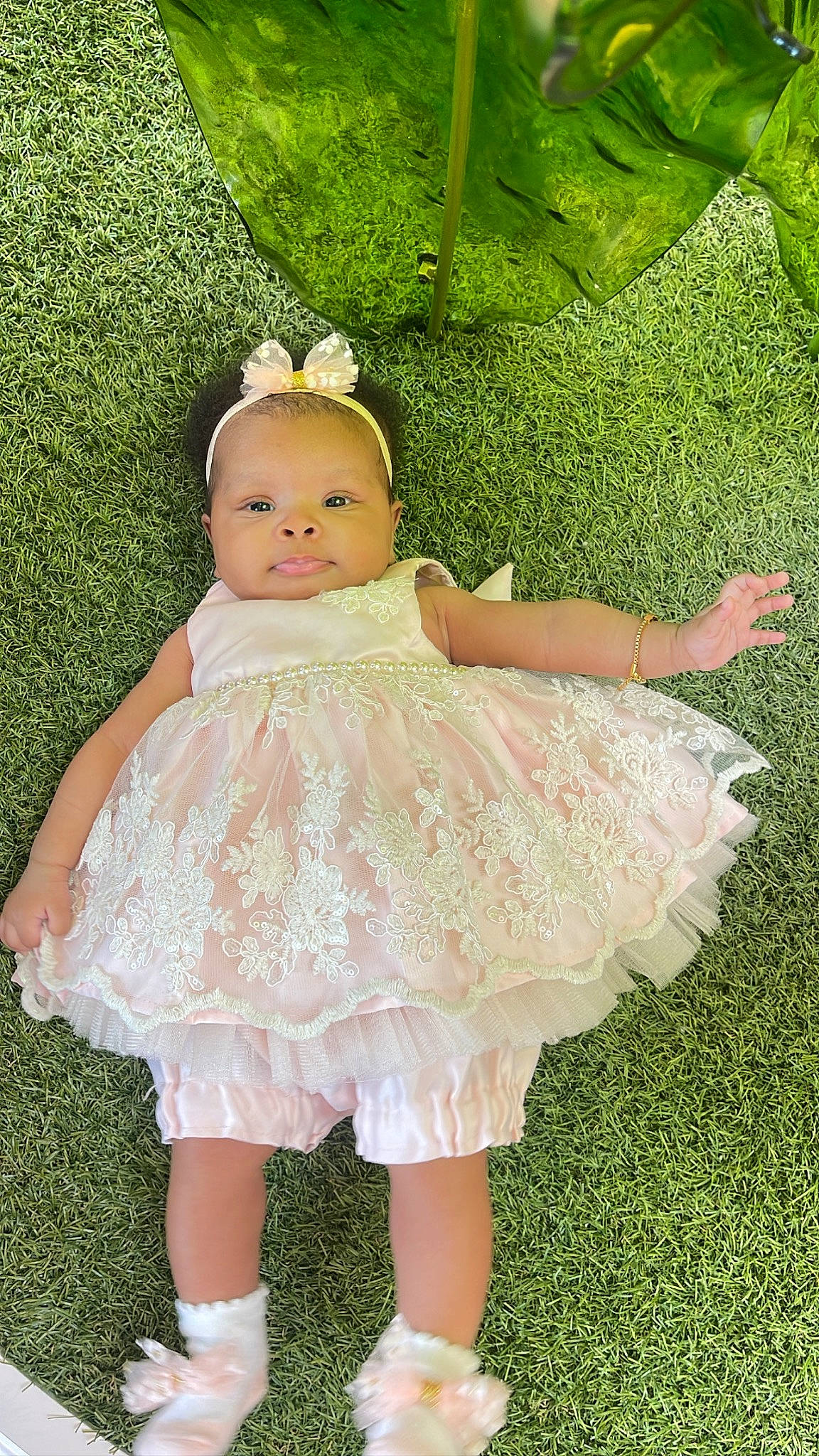 Kensington joined the competition — help win amazing prizes! baby, baby_toddler_clothing, child, day_dress, dress, embellishment, grass, green, happy, headgear, leaf, pattern, people_in_nature, person, petal, pink, plant, skin, sleeve, toddler