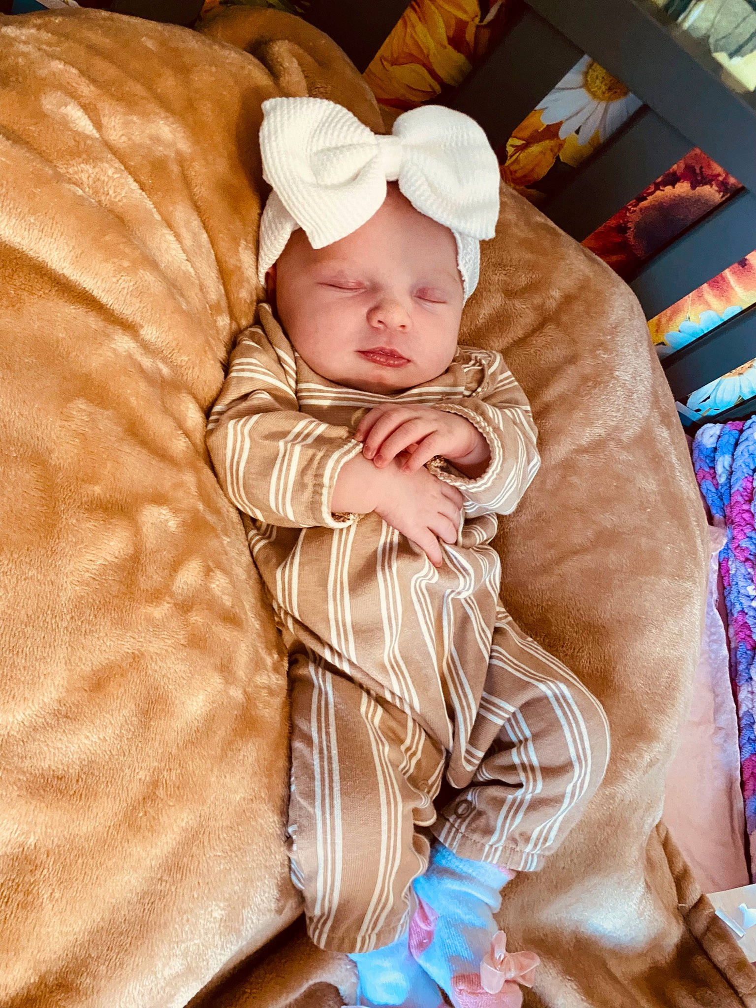 Briella is registered to the contest to win money with this photo: baby, baby_products, baby_sleeping, baby_toddler_clothing, cap, child, comfort, flooring, fun, fur, happy, head, headwear, hoodie, linens, person, play, room, sitting, sleeve