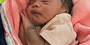 Damira is registered to the contest to win money with this photo: baby, blanket, child, comfort, cozy, cute, face, hand, indoors, infant, newborn, peaceful, pink, portrait, resting, sleeping, soft, toddler, warm, wrapped