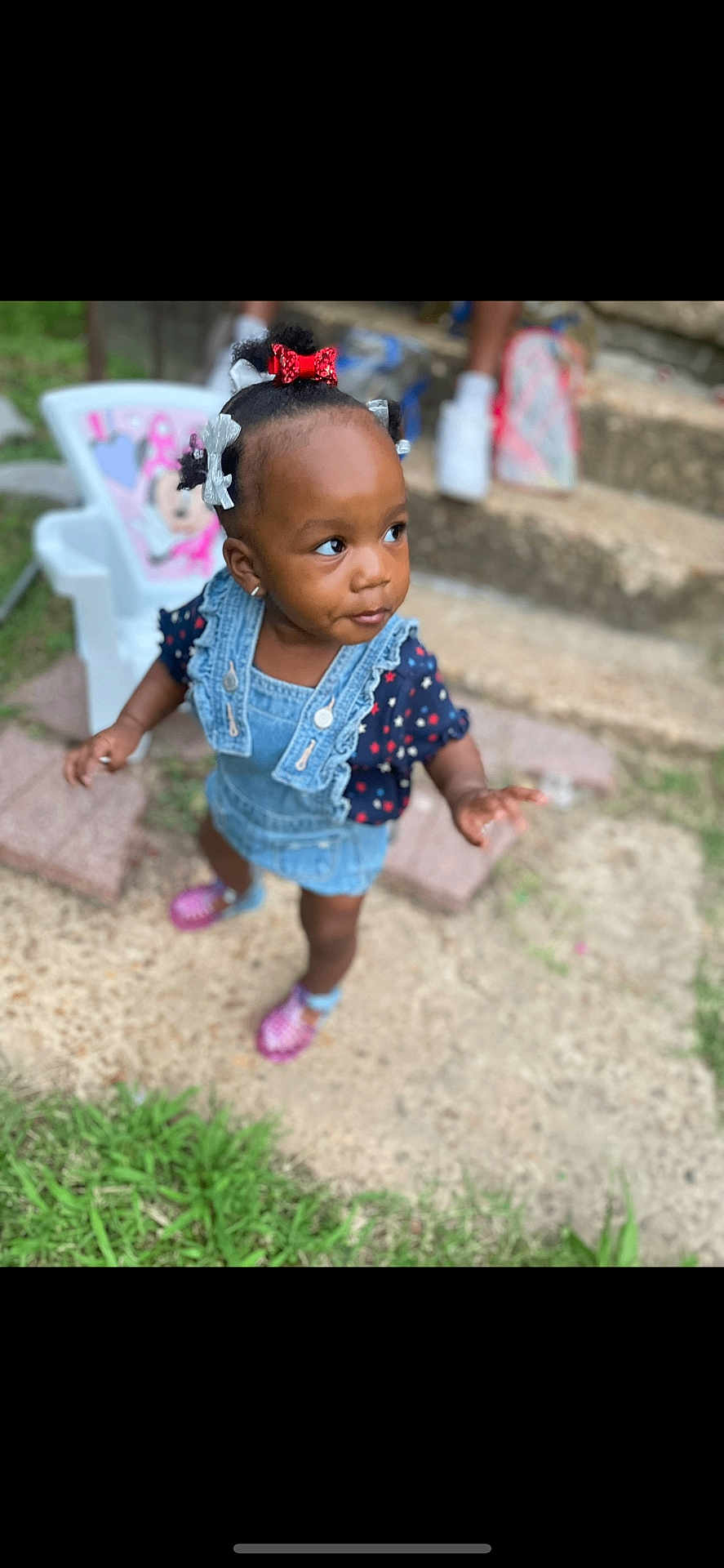 Damira joined the competition — help win amazing prizes! toddler, child, outdoor, grass, steps, denim, hair_bows, curious, walking, shoes, playful, person, cute, young_child, summer, daylight, fashion, portrait, expression, background_blur