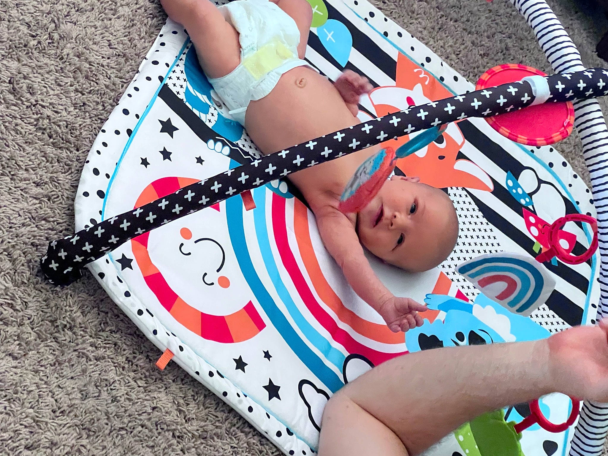 Braylen is registered to the contest to win money with this photo: baby, baby_products, baby_toddler_clothing, carmine, child, eyelash, fashion_accessory, finger, foot, fun, hand, happy, hat, musical_instrument, nail, pattern, person, pink, thigh, toddler
