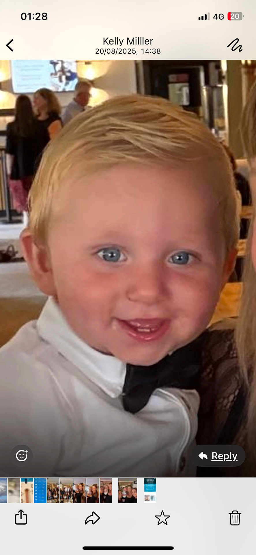 Greyson is registered to the contest to win money with this photo: toddler, child, smiling, indoor, portrait, blond_hair, blue_eyes, formal_wear, bow_tie, white_shirt, face, person, happy, close_up, background_people, social_event, casual, young_child, cute, celebration