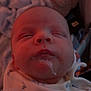 Logan is registered to the contest to win money with this photo: baby, sleeping, drool, onesie, infant, face, blanket, cozy, child, cute, peaceful, indoors, portrait, head, newborn, soft, clothing, resting, toddler, sleep
