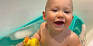 Kaiden is registered to the contest to win money with this photo: baby, babylaughing, bathing, bathtub, bubble, face, happy, head, hottub, indoors, laughing, leisureactivities, newborn, person, photography, pool, portrait, smile, sport, swimming