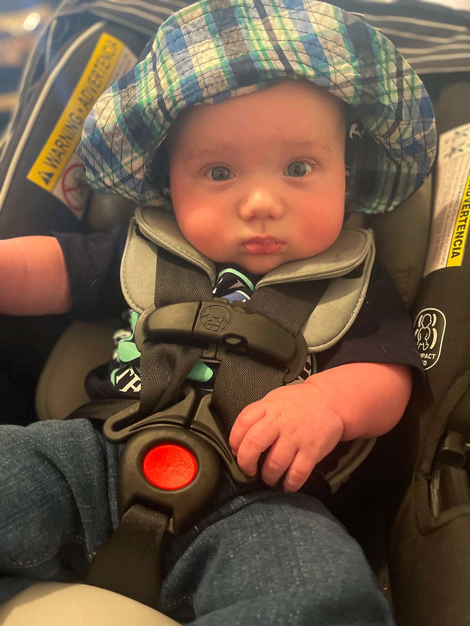 Killian joined the competition — help win amazing prizes! baby, baby_carriage, baby_products, baby_safety, baby_toddler_clothing, cap, car_seat, cheek, child, comfort, cool, hat, headwear, outerwear, people, person, product, sitting, skin, sun_hat