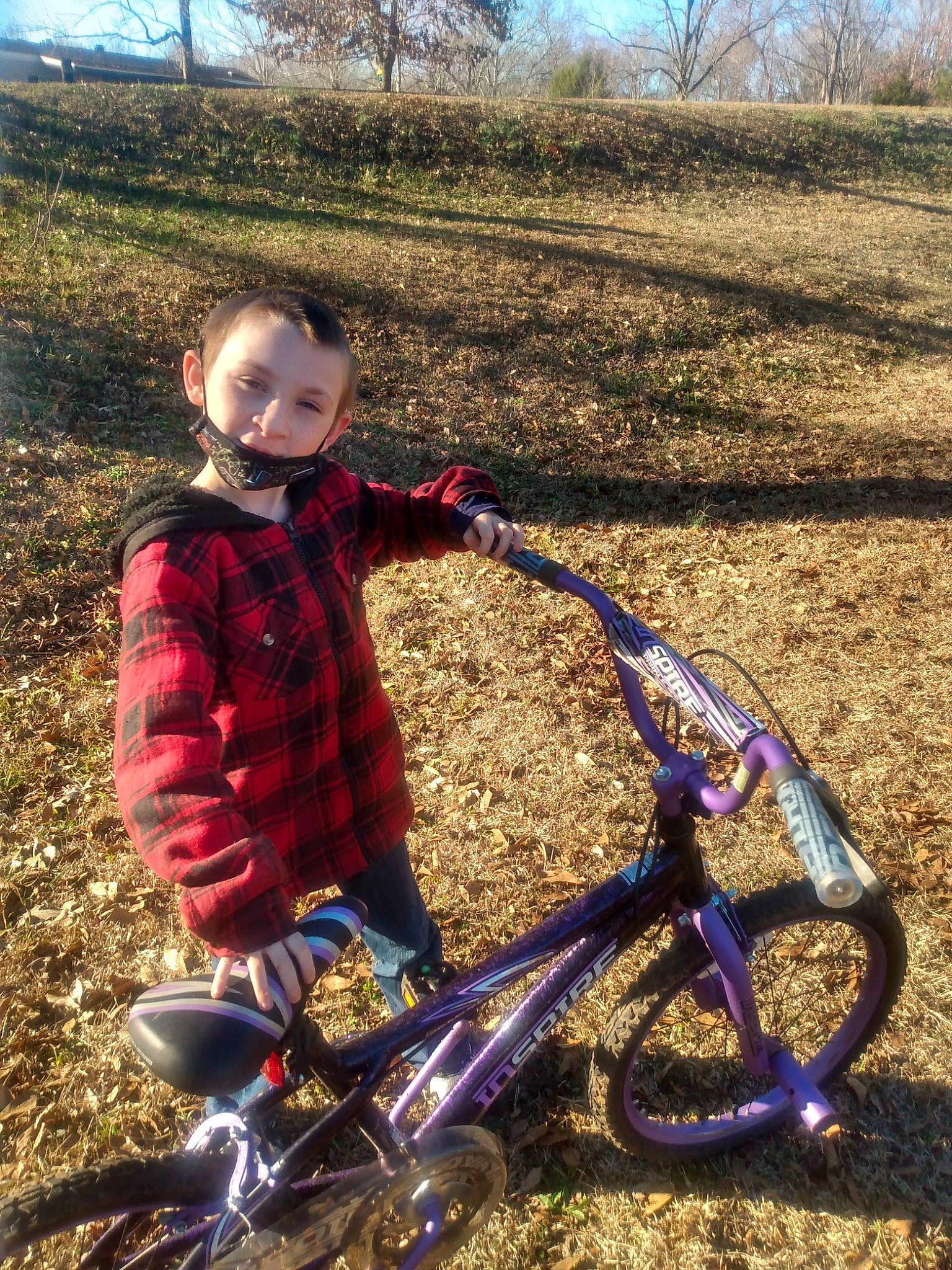 Caden joined the competition — help win amazing prizes! automotive_tire, bicycle, bicycle_accessory, bicycle_fork, bicycle_frame, bicycle_handlebar, bicycle_part, bicycle_saddle, bicycle_tire, bicycle_wheel, bicycles_equipment_and_supplies, grass, outdoor_recreation, people_in_nature, person, recreation, rim, spoke, tire, tree