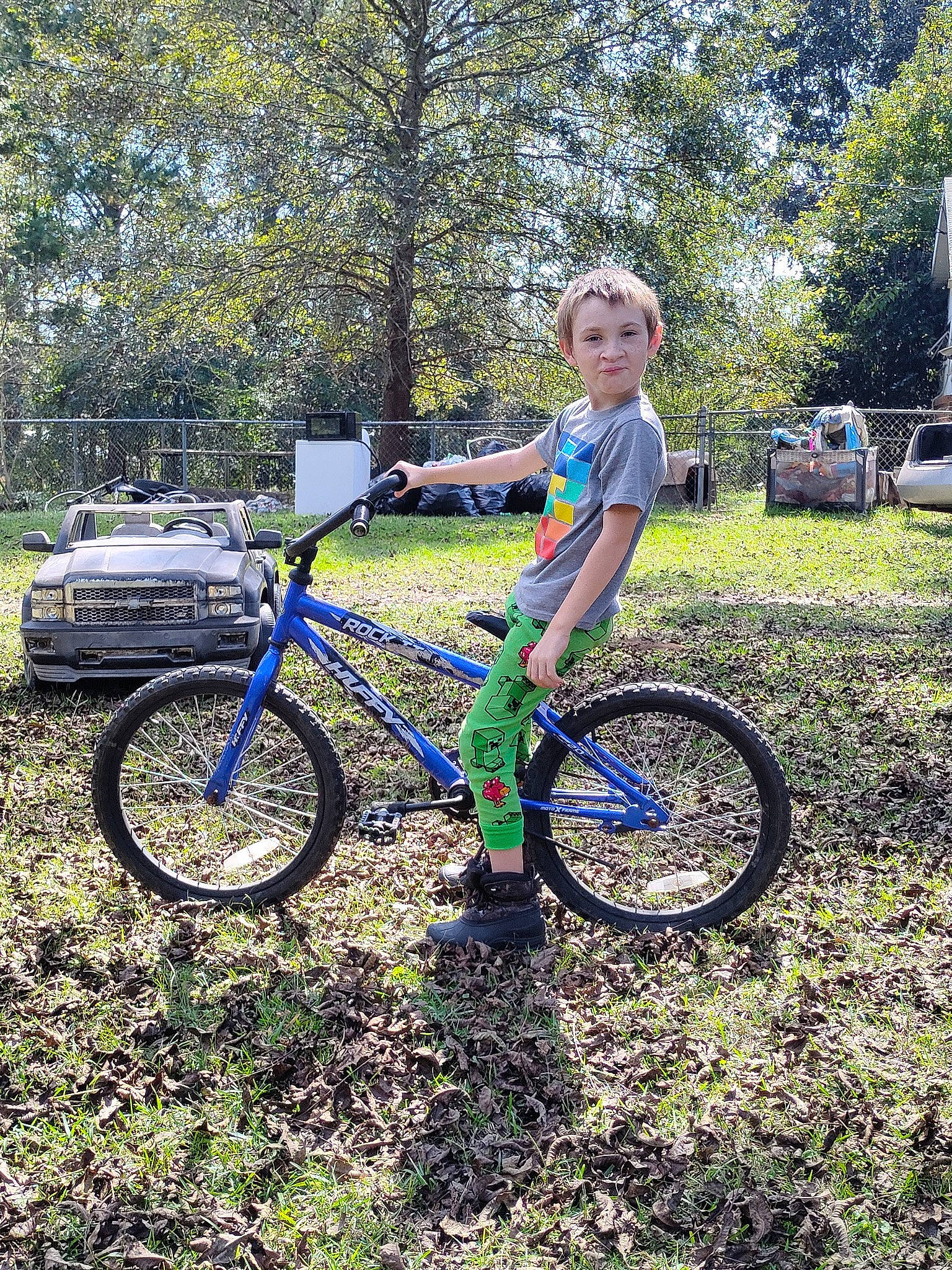 Caden is registered to the contest to win money with this photo: automotive_tire, bicycle, bicycle_accessory, bicycle_fork, bicycle_frame, bicycle_handlebar, bicycle_saddle, bicycle_tire, bicycle_wheel, bicycles_equipment_and_supplies, crankset, hub_gear, land_vehicle, outdoor_recreation, person, plant, sunlight, tire, tree, vehicle