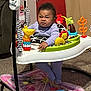baby, child, indoor, activity_jumper, toy, colorful, expression, face, playful, furniture, carpet, person, clothing, purple_outfit, animal_toy, plastic, infant, cute, scrunched_face, seat