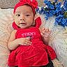 Amyra is registered to the contest to win money with this photo: baby, red_clothing, headband, lace, blue_flowers, seashells, starfish, infant, portrait, cute, smiling, indoor, person, fabric, closeup, skin, hand, eyes, background, colorful